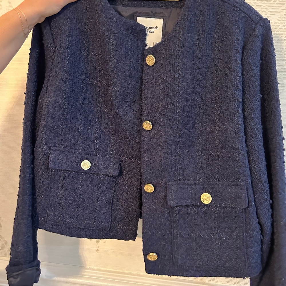 Women’s collarless, tweed jacket in navy